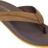 Comfortabele heren slippers met zachte zool en stevige band voor buitengebruik.