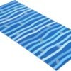 Blue striped beach mat with shark detail, perfect for outdoor leisure activities.