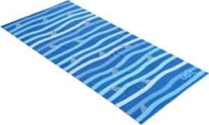Blue striped beach mat with shark detail, perfect for outdoor leisure activities.