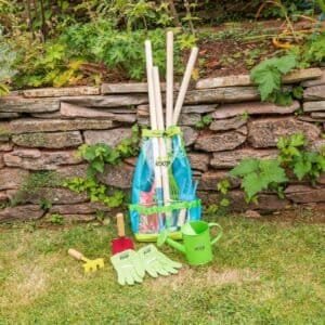 Planten verzorgingsset met tuingereedschap, handschoenen en waterkanna voor buiten tuinieren.