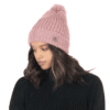Knitted pink beanie with pom-pom, perfect for outdoor winter style.