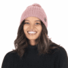 Knuffelige roze wollen muts voor dames, perfect voor de winter.