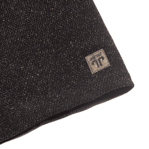 Glitterachtig zwart skatepresen met Tretorn logo.