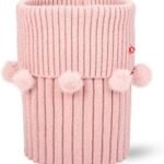 Knuffelige roze opbergmand met pompons, ideaal voor speelgoed en accessoires.