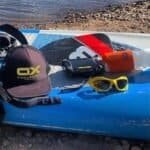 Sportuitrusting voor watersport en outdoorplezier op het strand of aan het water.